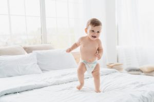 Happy baby with diaper