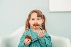 11 Unique Ways To Capture Baby Milestones In Pictures 9 baby eating chocolate